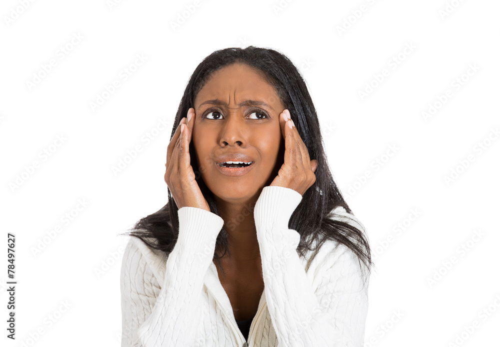 Closeup portrait stressed woman with headache holding head Closeup portrait stressed woman with headache holding head