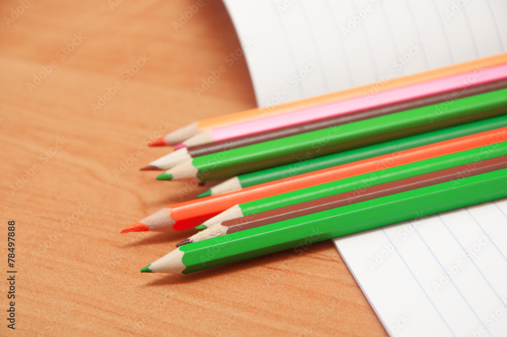 pencils on notebook pencils on notebook