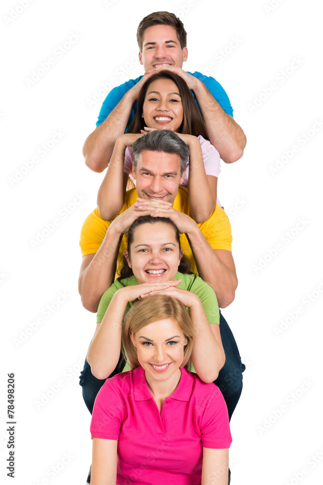 Group Of Multiethnic  Friends Stacked In A Row