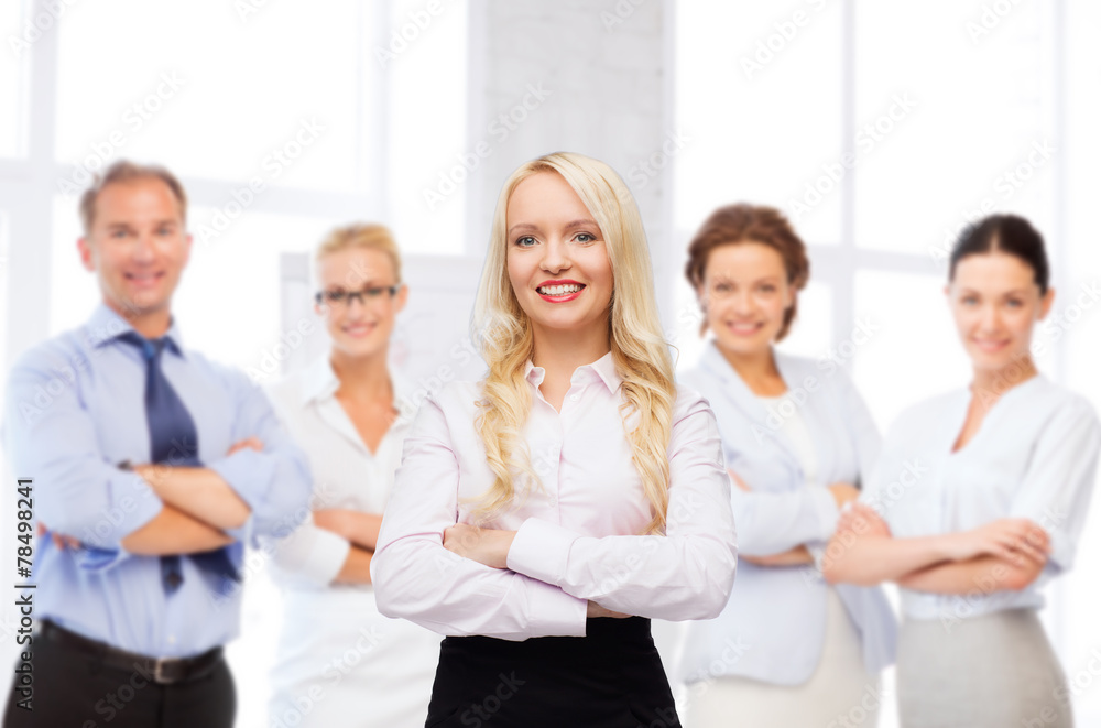 smiling businesswoman or secretary in office smiling businesswoman or secretary in office