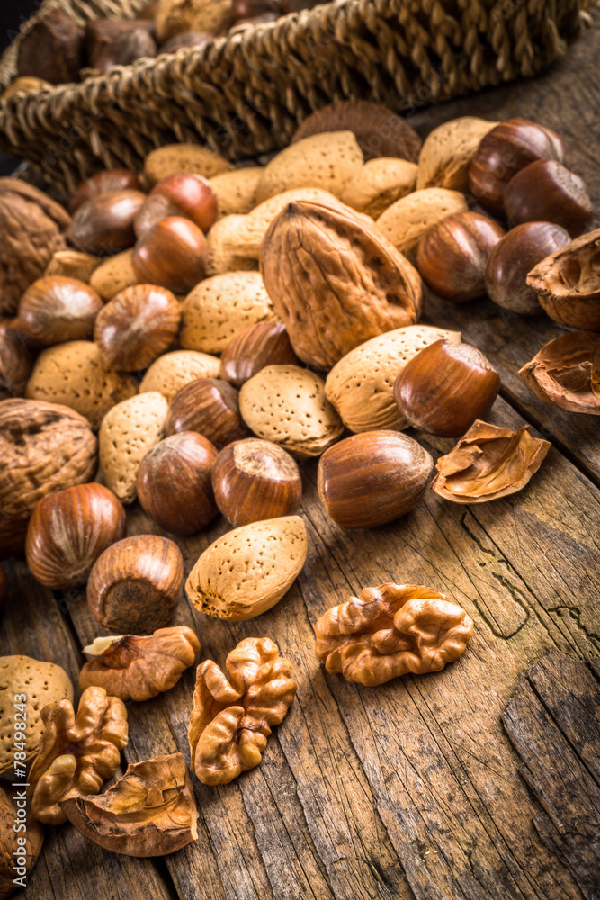 heap of different kinds of nuts in shell heap of different kinds of nuts in shell