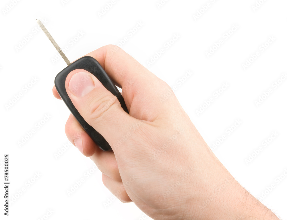 Hand holding car keys isolated on white background Hand holding car keys isolated on white background