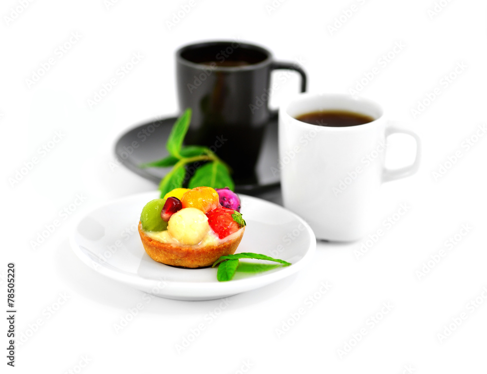 Small fruit cake and two cups of coffee Small fruit cake and two cups of coffee