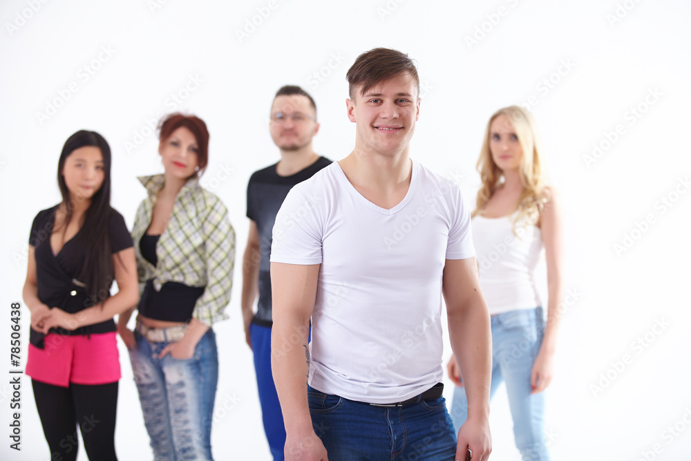 young blonde on the background of the group are the students young blonde on the background of the group are the students