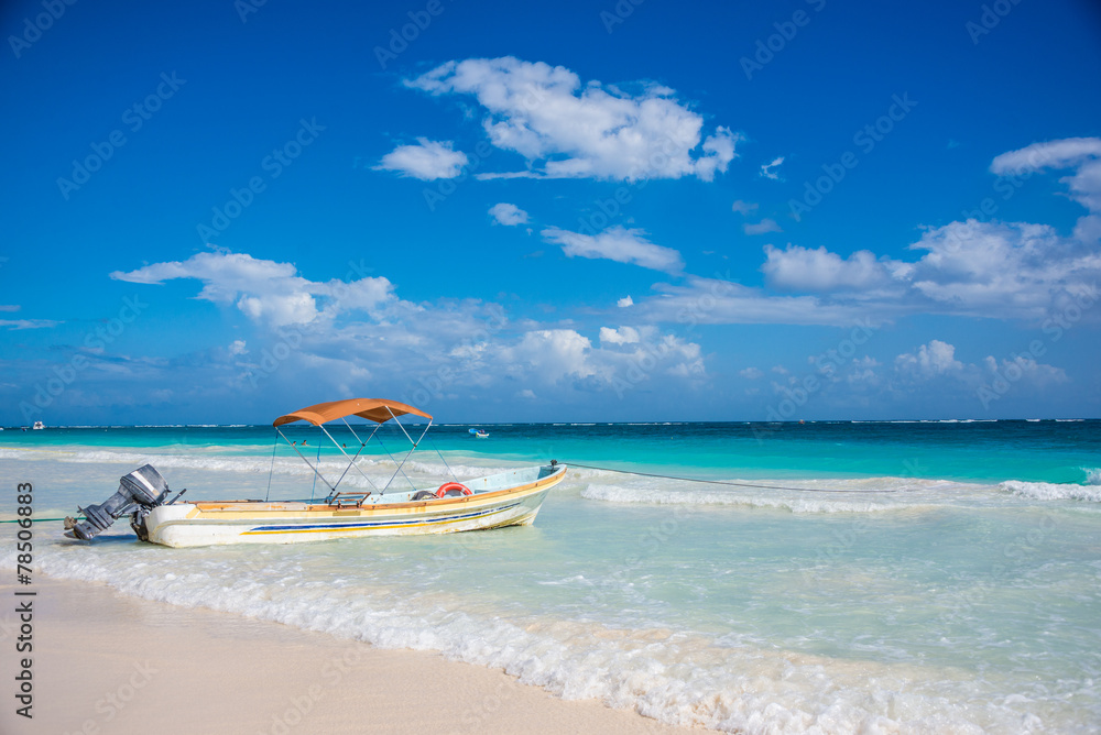 Tulum beach view and local boat caribbean paradise, at Quintana