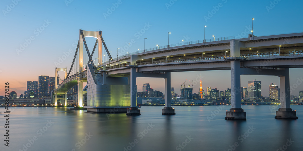 Rainbow bridge at night with Tokyo tower in background Rainbow bridge at night with Tokyo tower in background