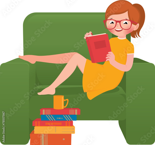 Girl reading a book sitting in a chair