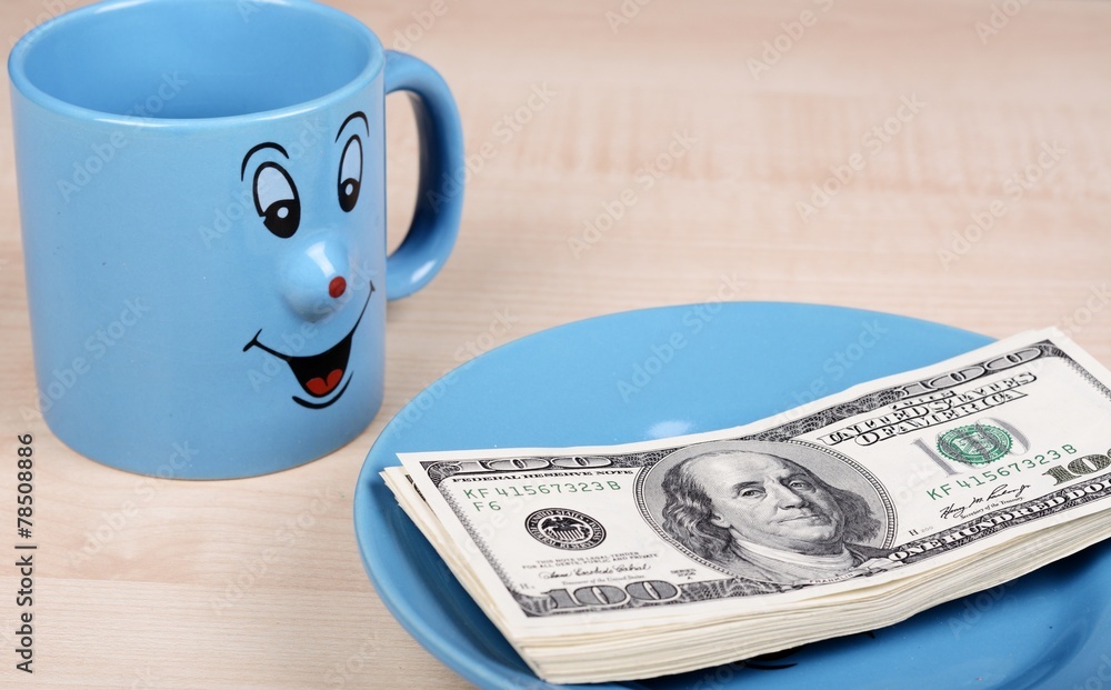 Cup and dollar. The cup is looking for dollars