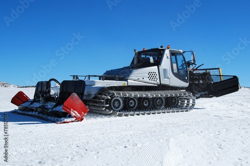 Canvas Print Ski piste snow groomer machine