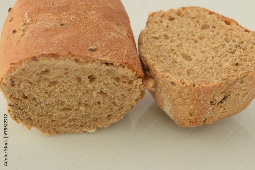 A slice of bread on a chopping board. A slice of bread on a chopping board.