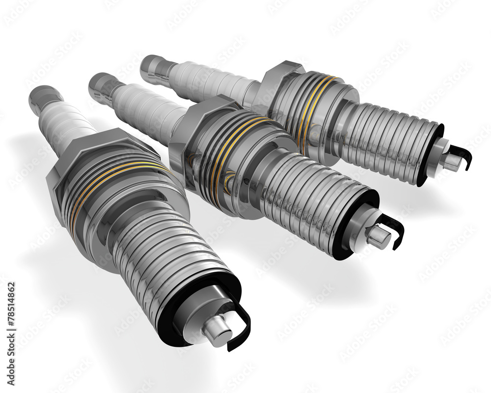 three spark plugs isolated on white background three spark plugs isolated on white background