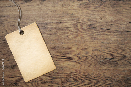 price tag on old wooden tab...