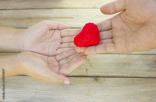 Help give love each other,Heart in Hand