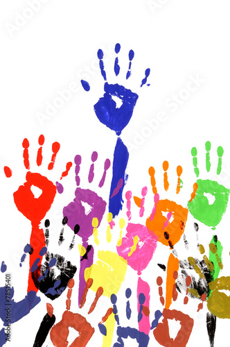 Raised hands in acrylic paint with handprints isolated on white background photo