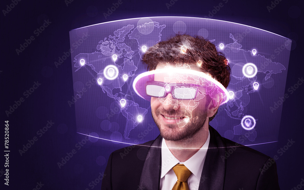 Young man looking at futuristic social network map Young man looking at futuristic social network map