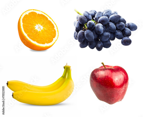 Fresh sliced orange fruit  Branch of blue grapes  Red apples and