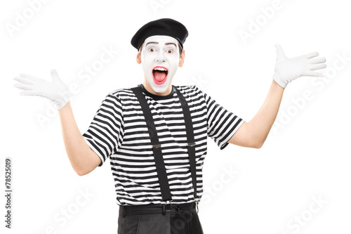 Mime artist gesturing joy with his hands photo