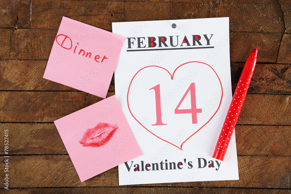 Valentines Day, February 14 on calendar on wooden background Valentines Day, February 14 on calendar on wooden background