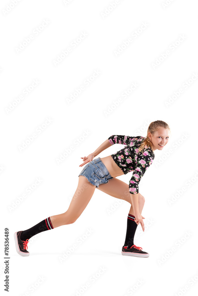 modern dancer poses in front of studio background modern dancer poses in front of studio background