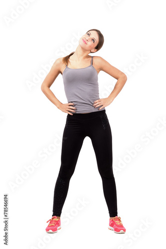 Fit young woman stretching neck