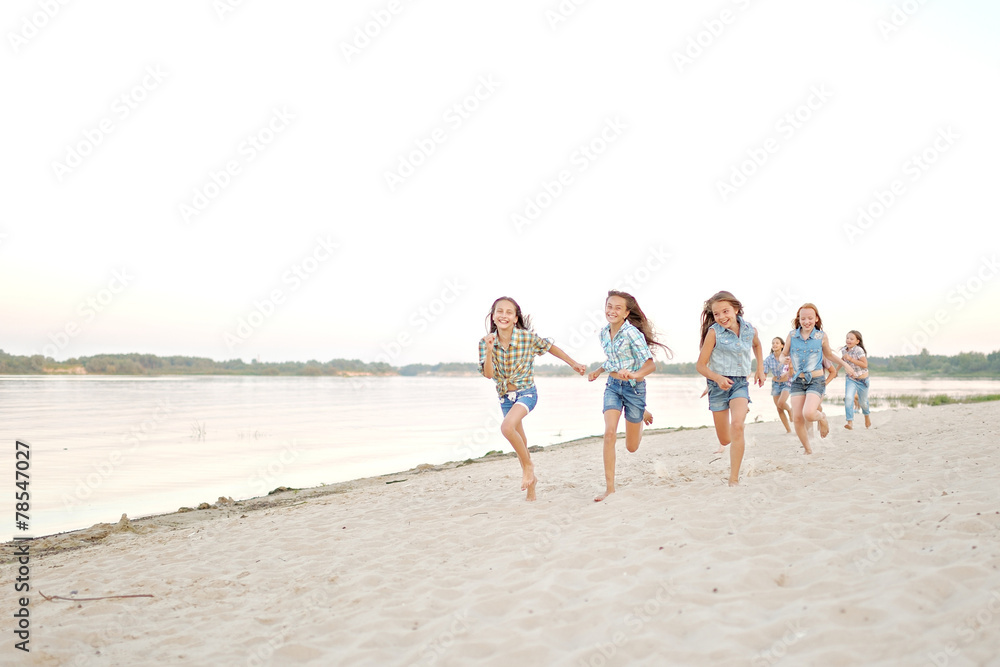 Portrait of joyful beautiful girlfriends on the nature Portrait of joyful beautiful girlfriends on the nature