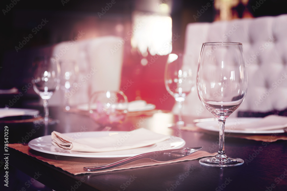 Place setting in a restaurant, toned Place setting in a restaurant, toned