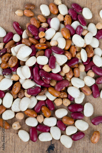 various beans on wooden surface