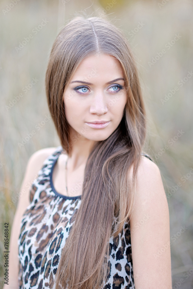beautiful elegant brunette girl in a field beautiful elegant brunette girl in a field