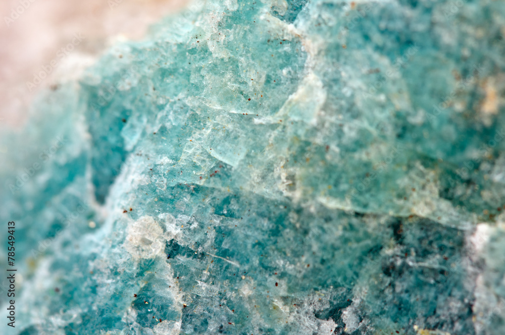 Amazonite is a bluish-green variety of microcline feldspar