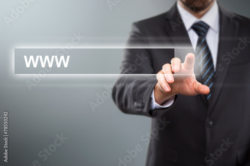 business man touching a screen with a link
