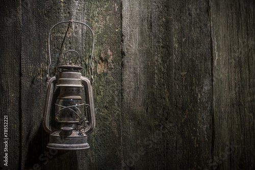 Old gas lantern on wood