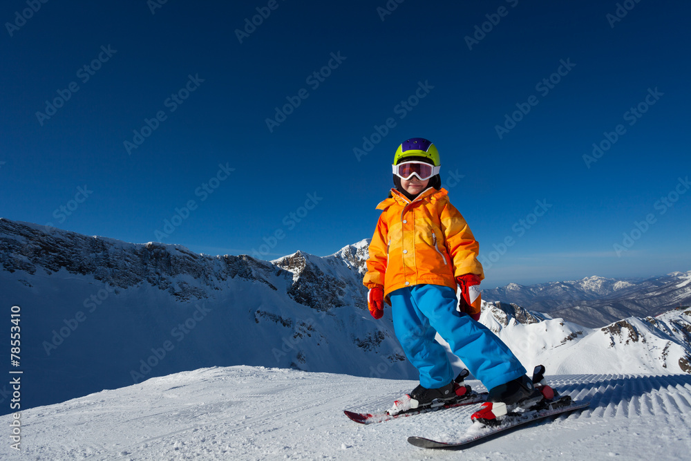 Boy in mask skiing on Krasnaya polyana ski resort