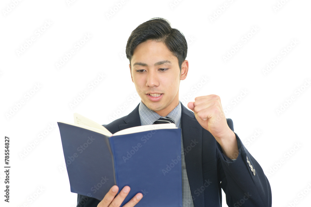 ガッツポーズのビジネスマン