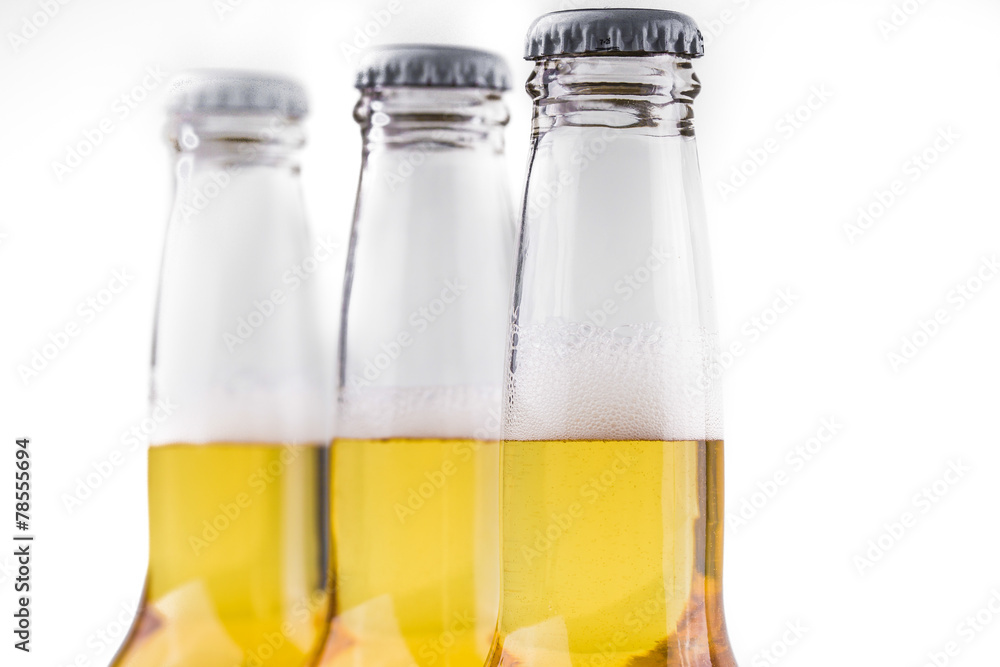three bottles of beer isolated on white three bottles of beer isolated on white