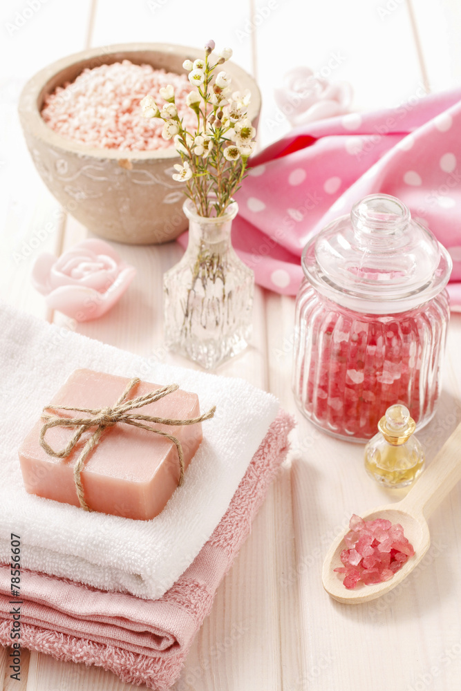 Bar of natural handmade soap lying on a towel