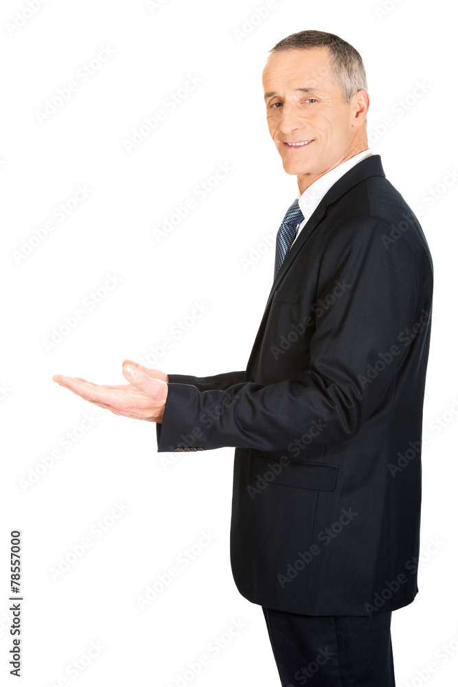 Businessman holding something invisible Businessman holding something invisible