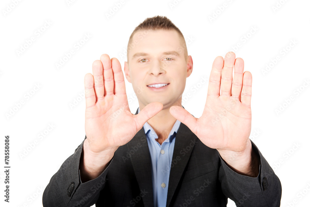 Businessman gesture stop sign with his hands Businessman gesture stop sign with his hands