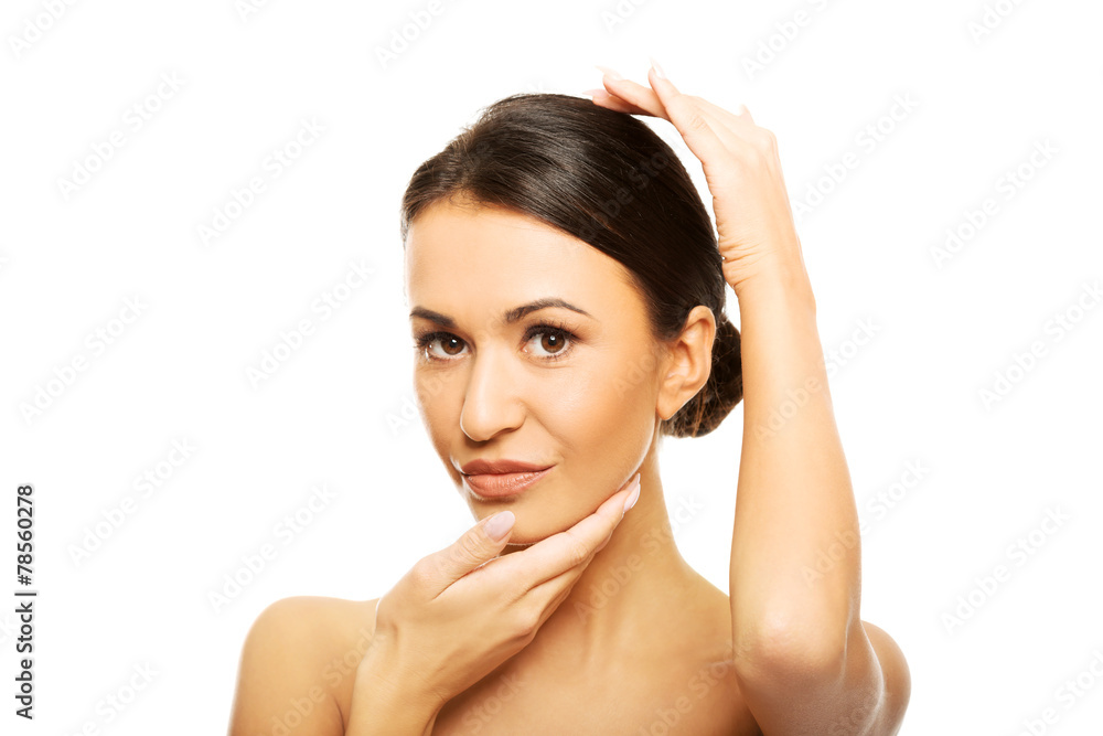 Spa woman holding hand on chin