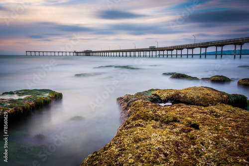 Wallpaper Mural Long exposure of waves on rocks and the fishing pier in Ocean Be Torontodigital.ca