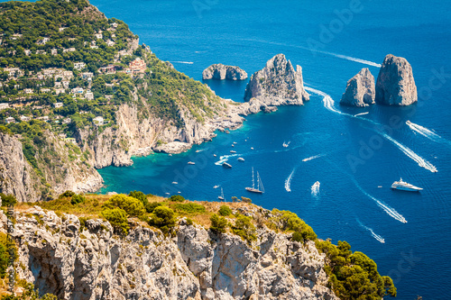Capri, Faraglioni in the mediterranean sea. Italy, Naples photo