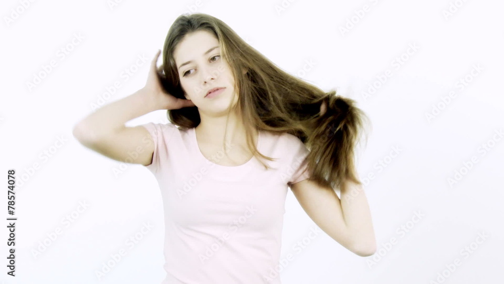 Girl with long hair annoyed by volume and split ends Girl with long hair annoyed by volume and split ends