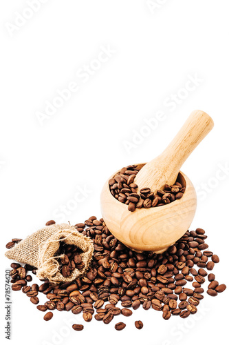 Coffee beans in wooden bamboo mortar isolated on white