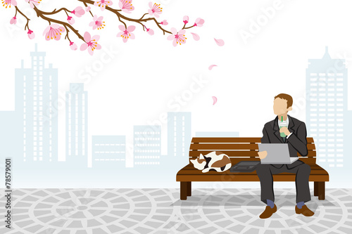 Employee sitting on a bench Spring Time