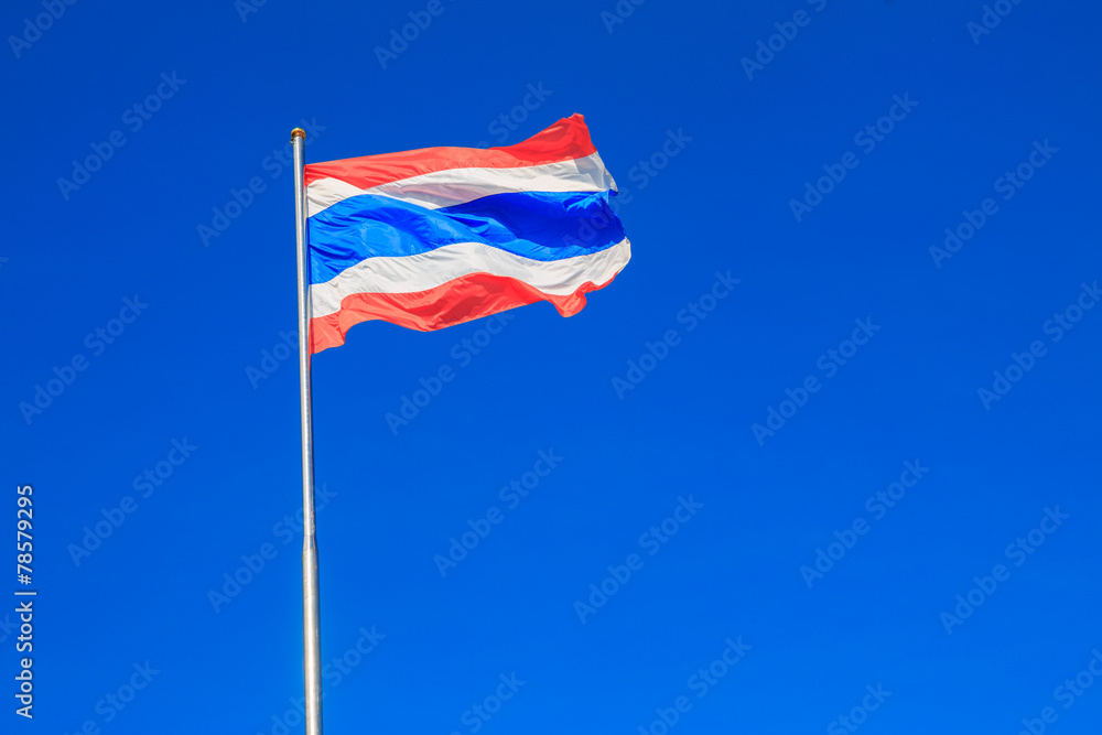 Thai flag of Thailand with blue sky background. Thai flag of Thailand with blue sky background.