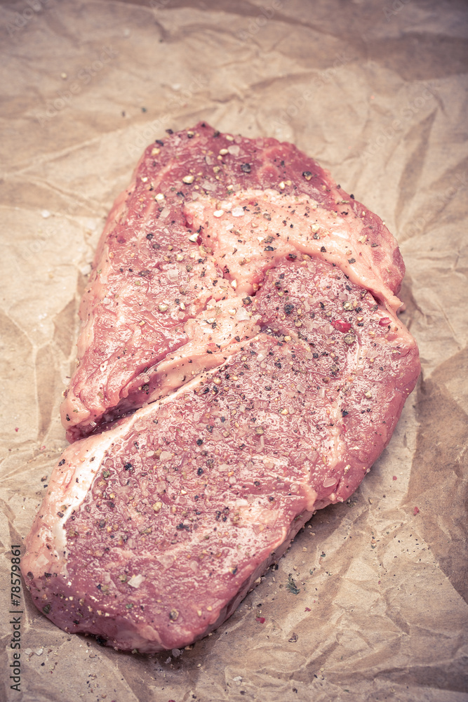 Obraz premium fresh, grilled beef steak on wooden background 