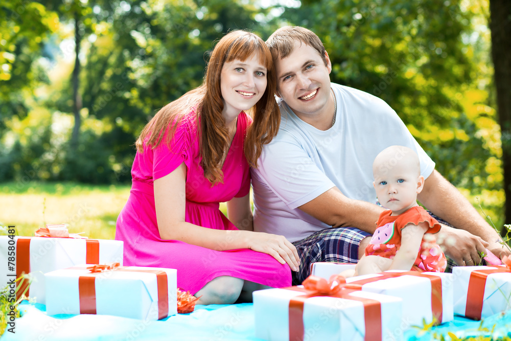 Joyful family with gift boxes Joyful family with gift boxes