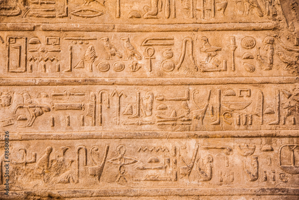 old egypt hieroglyphs carved on the stone