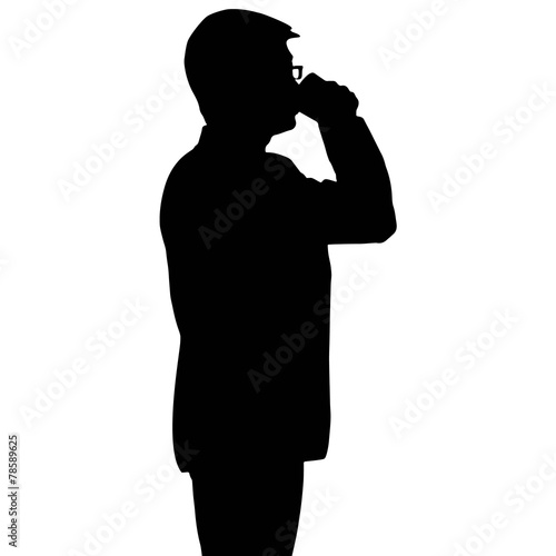 Silhouette businessman drinking a cup of coffee