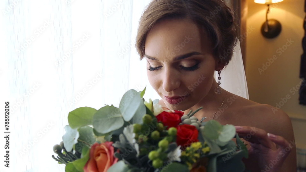 Portrait of the beautiful bride with a bouquet of flowers. Portrait of the beautiful bride with a bouquet of flowers.