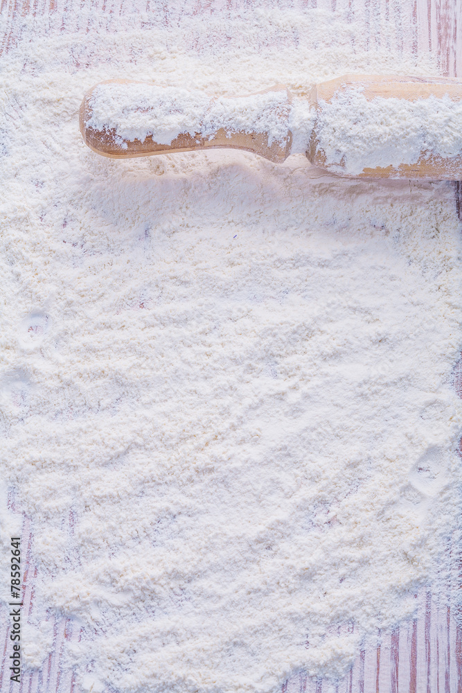 Obraz premium copyspace photo handle of wooden rolling pin with flour food and